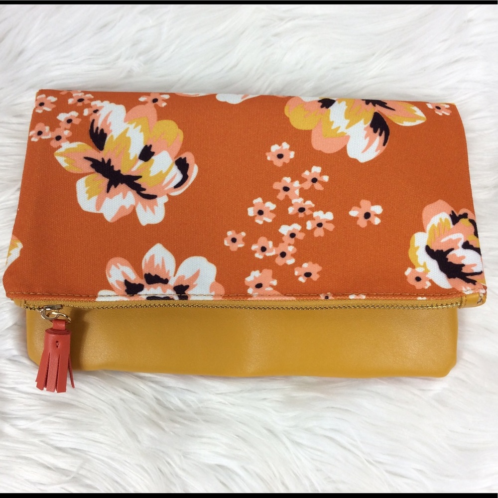 Rachel Pally mustard yellow floral print clutch.